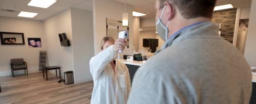 temperature check before visiting to dentistry at lexington
